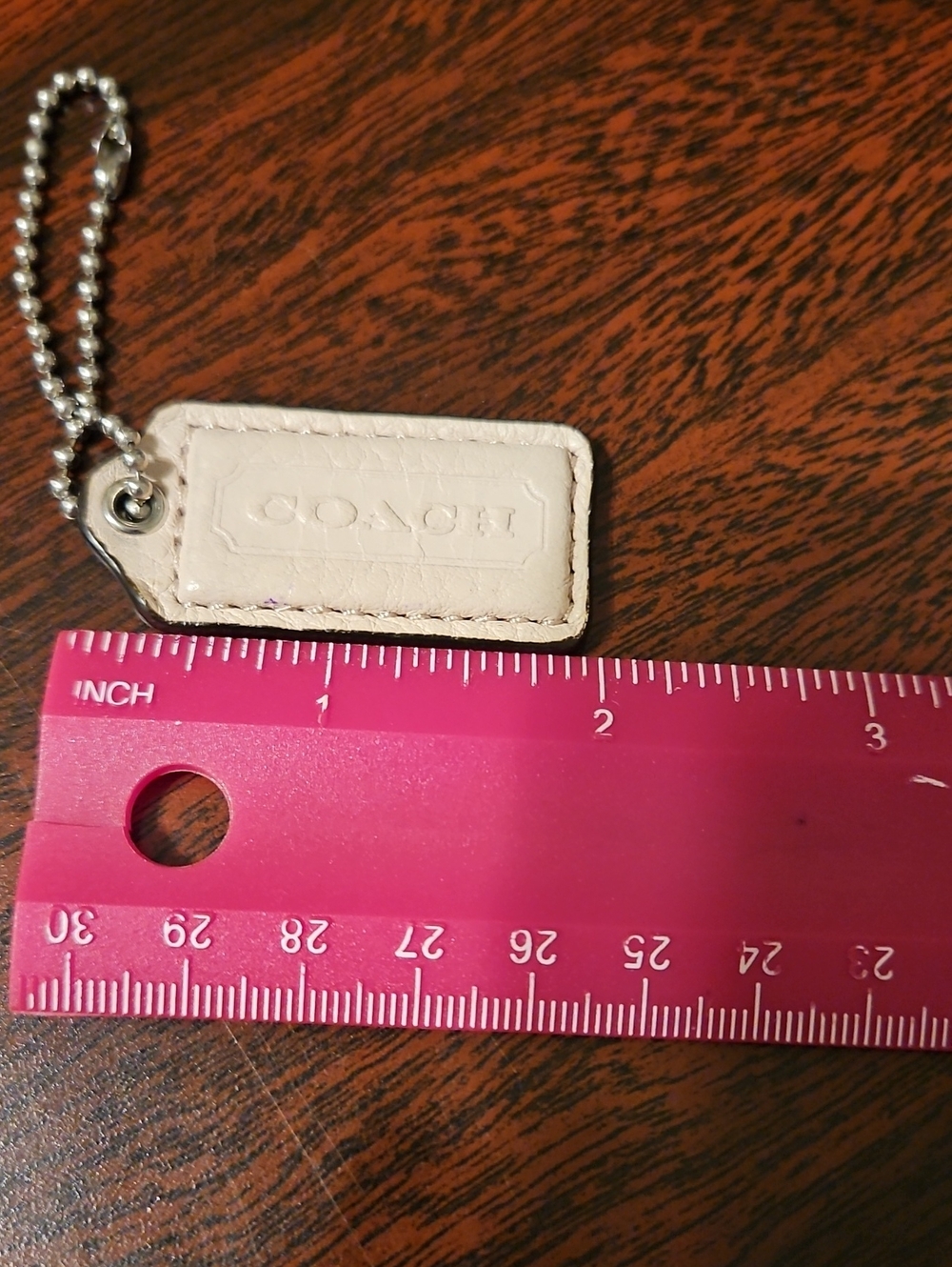 Coach Hang Tag